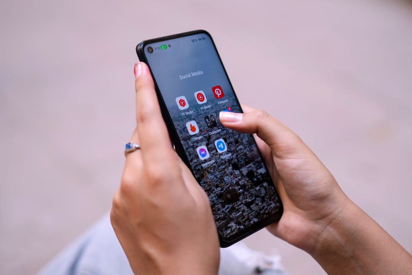 A smartphone showing a social feed going viral with rising engagement
